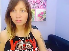 aTattooedCutie undresses and shows off her tattoo