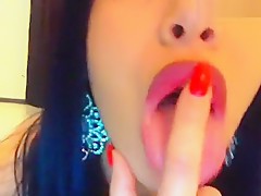Beauty brunette caresses her pussy